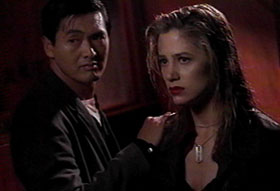 Chow Yun-Fat and Mira Sorvino